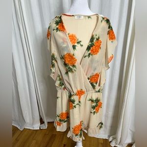 Orange flower print romper